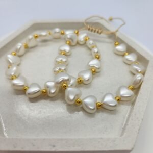 Juego dos pulseras con corazones perlados