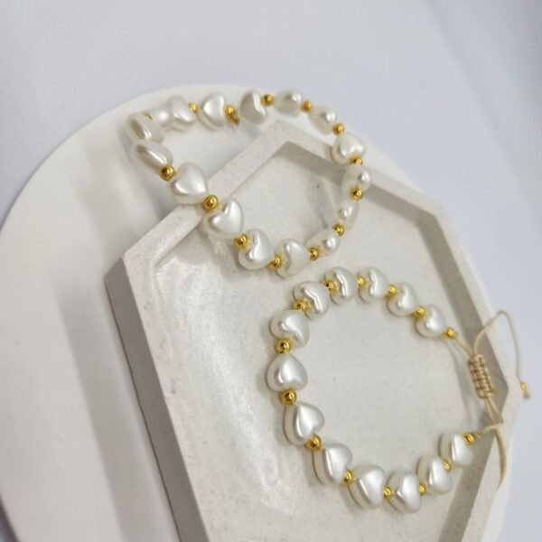 Juego dos pulseras con corazones perlados