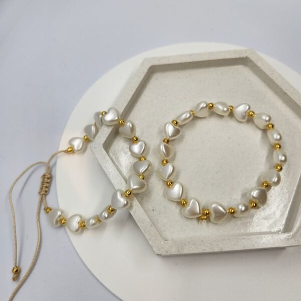 Juego dos pulseras con corazones perlados