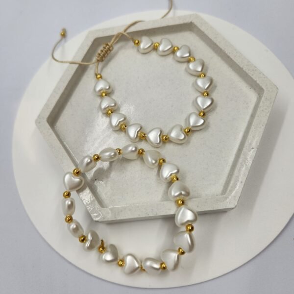 Juego dos pulseras con corazones perlados